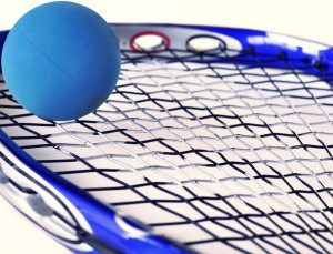 Ball on racquet header